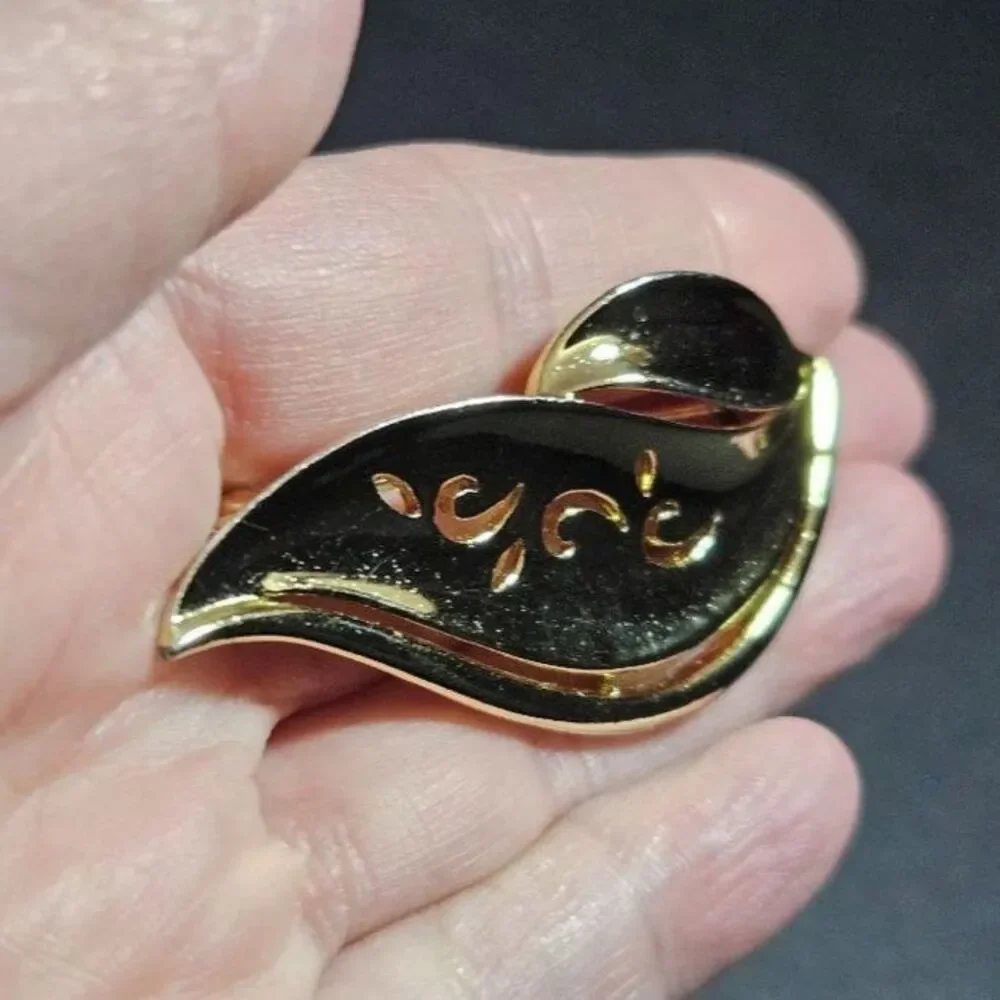 AJC vintage gold tone brooch